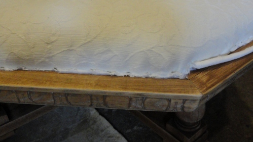 covering the raw stapled edges with single welting-